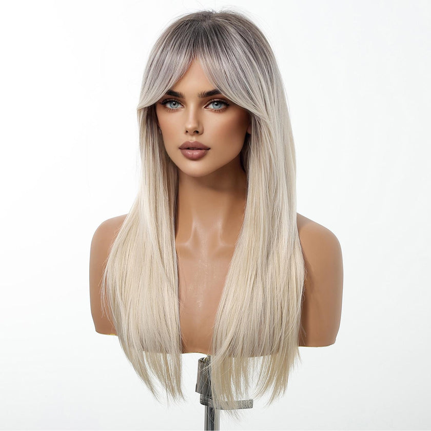 Female mannequin bust showcasing a long, straight DWY wig. The hair has dark roots that transition to a cool platinum blonde, finished with face-framing curtain bangs.