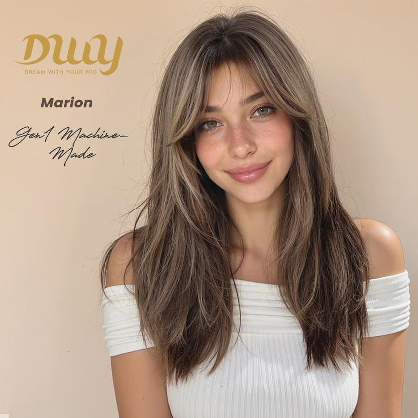 Model wearing a long, layered, light brown DWY 