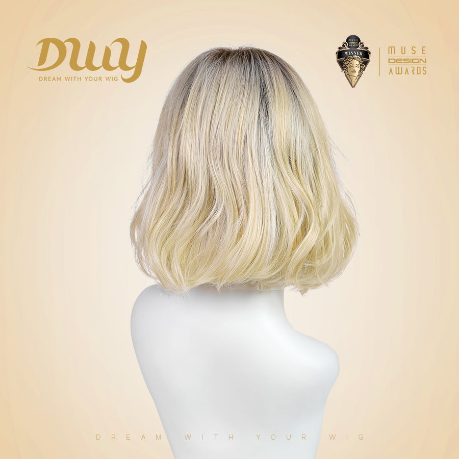 Becca-DWY Mono SkinWeft Free Part Warm Blonde Curly Glueless Synthetic Wig