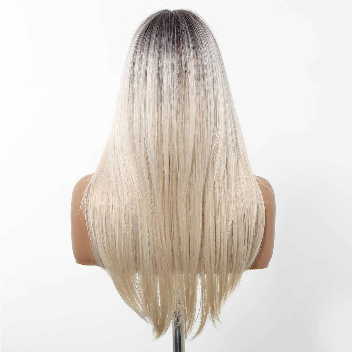 A back view of a female mannequin bust displaying a long, straight DWY wig. The wig features a dark root-smudge design that transitions sharply into a bright, icy platinum blonde color. 