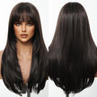 A split-panel product photograph displaying two views of the same long, dark brown layered wig. On the left, a realistic female mannequin head with full makeup and blue eyes models the front view, highlighting the wispy bangs and face-framing layers. On the right, a rear view of the wig on a form shows the overall length and the texture of the straight, layered hair. Both views are centered against a plain white studio background.