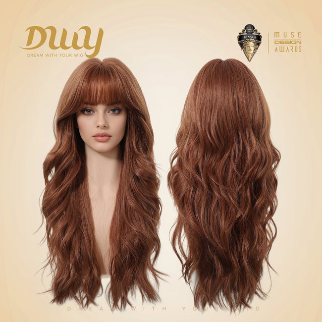 A dual-view product photograph presents the same long, wavy auburn-copper wig on two mannequin heads against a light beige background. The left mannequin shows the front view with face-framing layers and full bangs, while the right mannequin displays the back view of the voluminous waves. The gold 