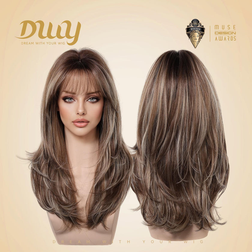 A double-view product shot of a female mannequin head displays a DWY brand synthetic wig. The wig features long, layered brown hair with blonde highlights and a full fringe. Both front and back views are shown against a beige background with the gold 'DWY DREAM WITH YOUR WIG' logo and a 'MUSE DESIGN AWARDS' badge.