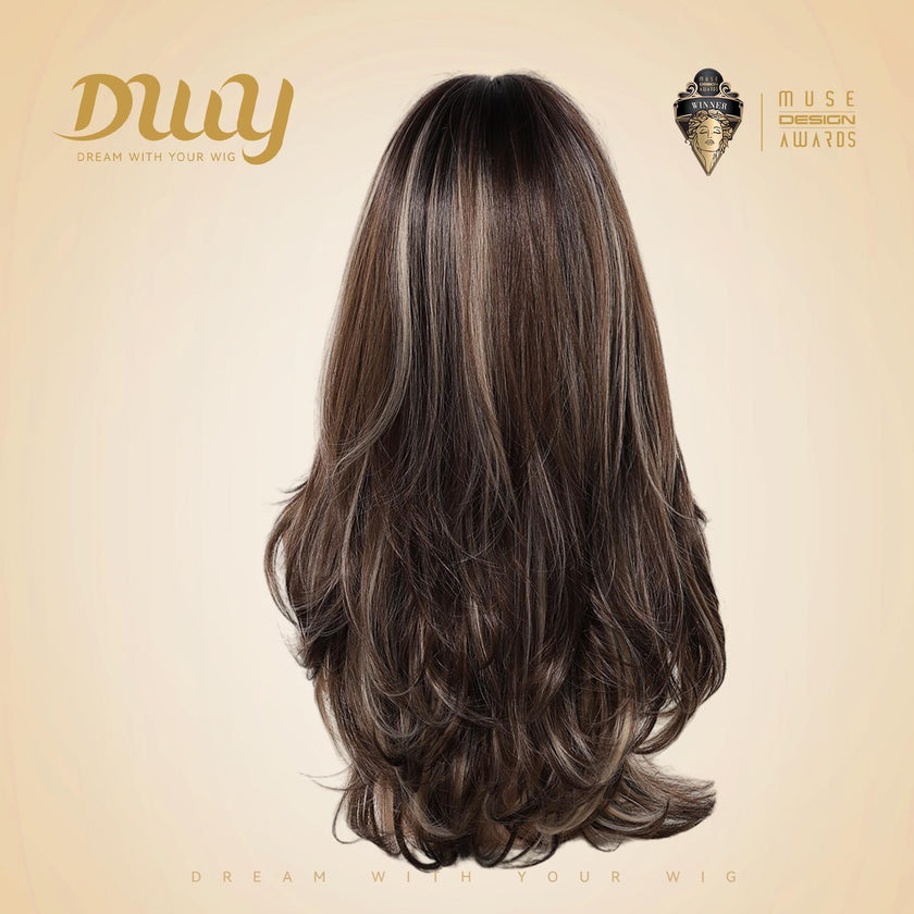 Back view of a mannequin head showcasing the DWY long layered synthetic wig in brown and blonde highlights, set against a beige studio backdrop with a logo badge.