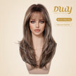 A female mannequin head displays a DWY long, layered synthetic wig with bangs in a highlighted brown and blonde color. The wig features a 