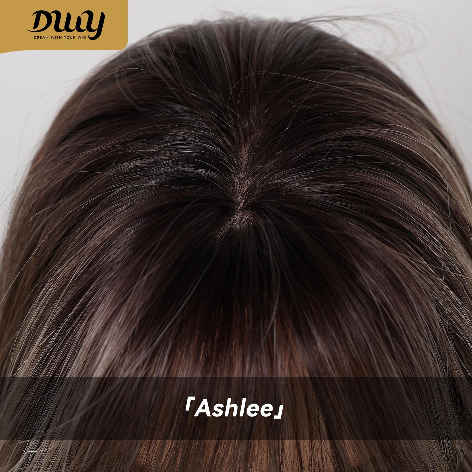 A detailed close-up of the parting line and roots on a DWY synthetic wig, showing multi-tonal brown hair with a realistic scalp effect and straight fringe.