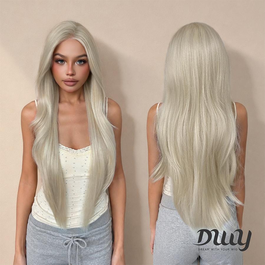 Front and back views of the same woman modeling a long, platinum blonde DWY wig with subtle layers. On the left, she faces forward; on the right, showing the back of the hair. She wears a cream lace-trimmed camisole and grey sweatpants. The DWY logo is in the bottom right.